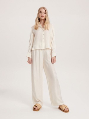 Reserved Cupro rich shirt Ivory | KMHF96823