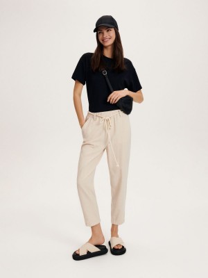 Reserved LADIES` TROUSERS Ivory | DJKO98152