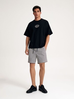 Reserved Oversized T-shirt with print Siyah | RJTY56231