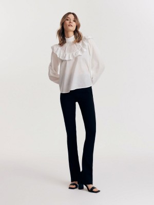 Reserved Ruffle blouse Ivory | KEPD54280